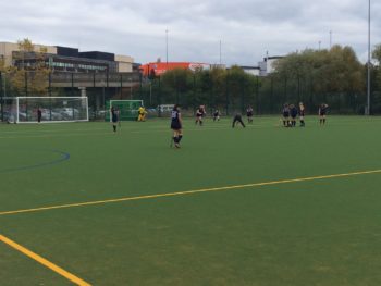 The University of Lincoln women's hockey team are warming up.
