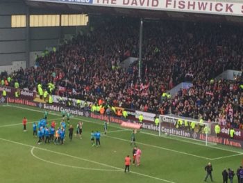 Imps fans celebrate after seeing their side knock out Premier League side Burnley